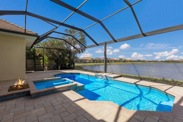 view of pool with a lanai, a water view, an in ground hot tub, and a patio