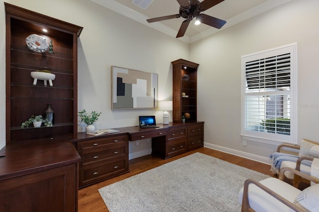 living area with light hardwood / wood-style flooring, ceiling fan, and ornamental molding