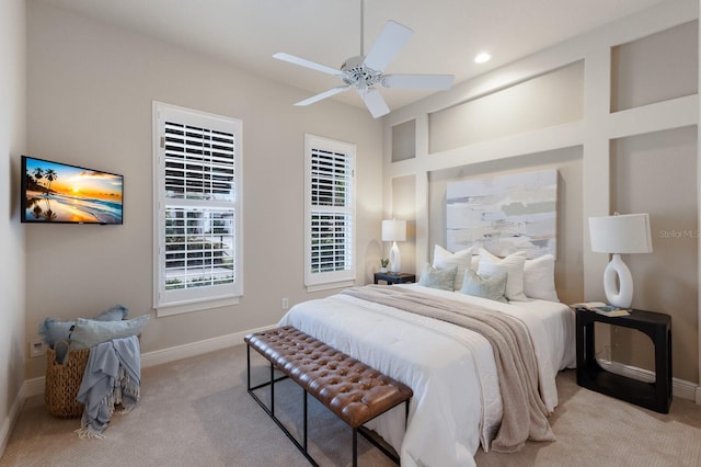 carpeted bedroom featuring ceiling fan