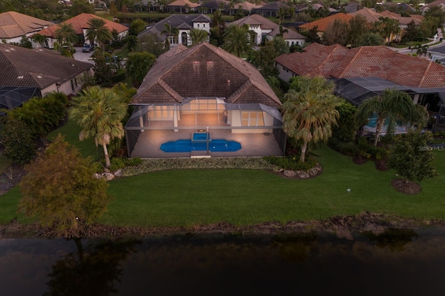 drone / aerial view with a water view