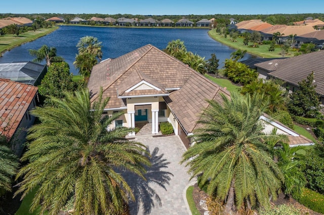 birds eye view of property featuring a water view