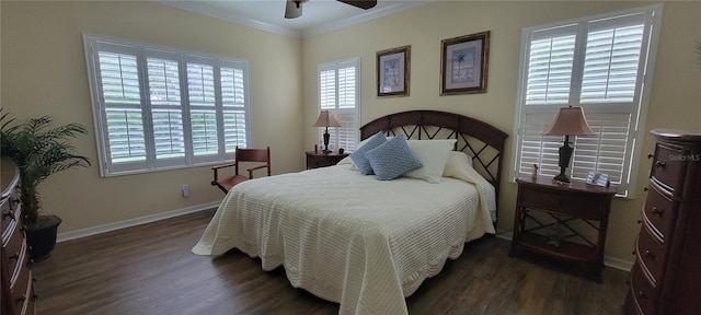 bedroom featuring multiple windows, ceiling fan, dark hardwood / wood-style flooring, and ornamental molding