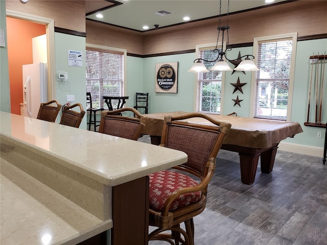 rec room featuring recessed lighting, baseboards, a wealth of natural light, and dark wood-type flooring