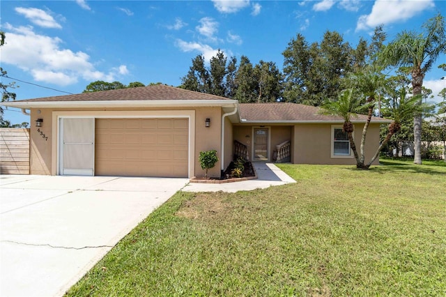 single story home featuring a front yard and a garage