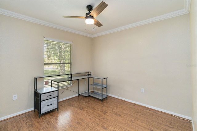 bedroom featuring wood-type flooring, ornamental molding, and ceiling fan