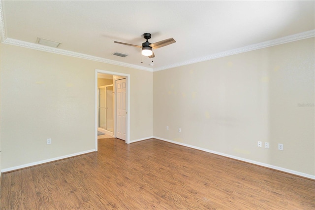 unfurnished room with ceiling fan, hardwood / wood-style flooring, and crown molding