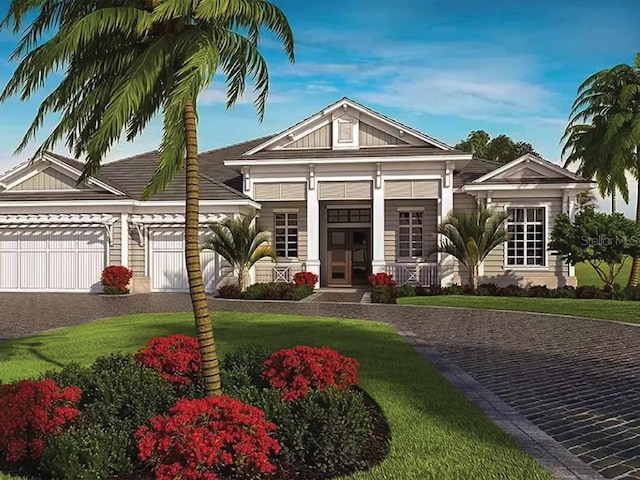 view of front facade with a front lawn and a garage