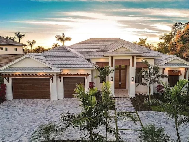 view of front of property featuring a garage