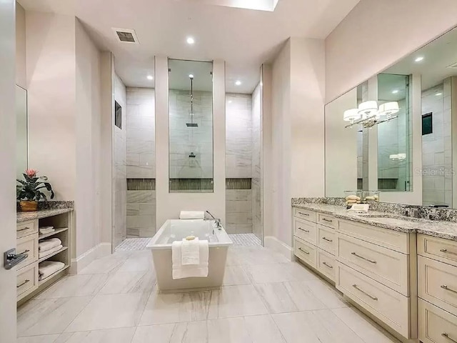 bathroom with vanity and plus walk in shower