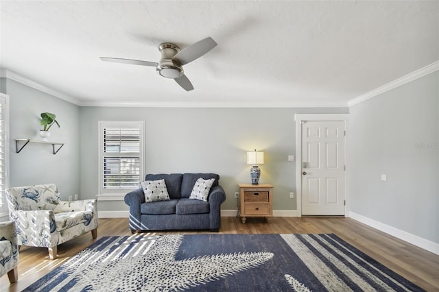 living room featuring ornamental molding, dark hardwood / wood-style floors, and ceiling fan