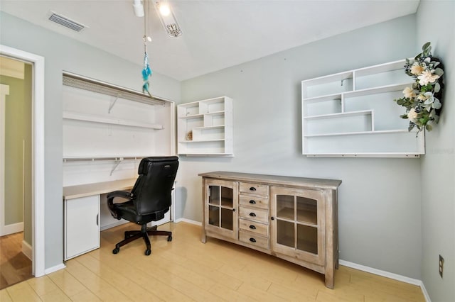 office space featuring light wood-type flooring