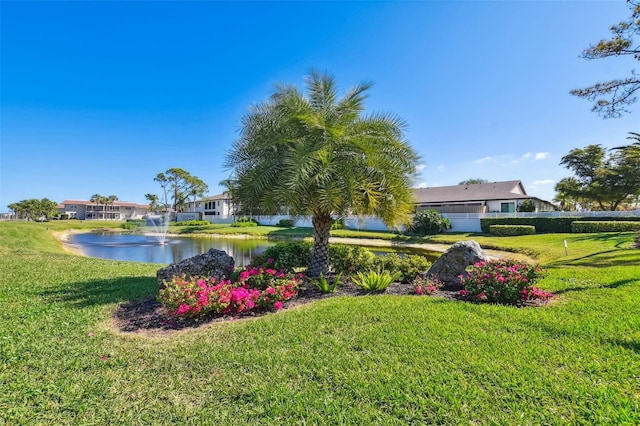 view of yard with a water view