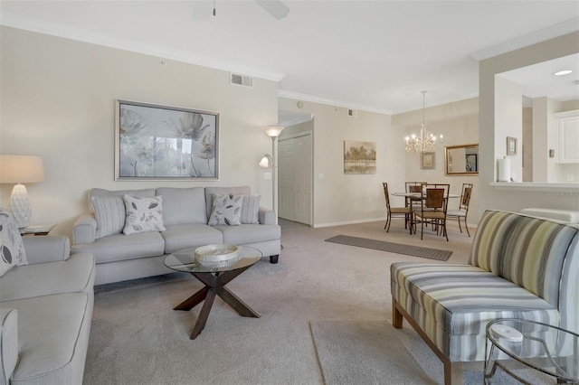 carpeted living room featuring ornamental molding and ceiling fan with notable chandelier