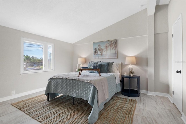 bedroom with vaulted ceiling