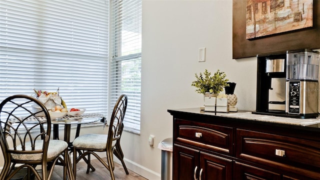 dining area featuring light wood-type flooring