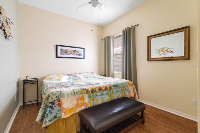 bedroom with ceiling fan and hardwood / wood-style flooring