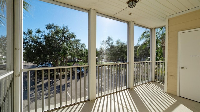 unfurnished sunroom with a healthy amount of sunlight