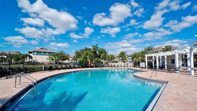 view of pool featuring a pergola and a patio