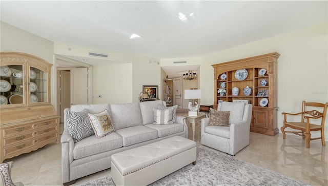 living room featuring an inviting chandelier