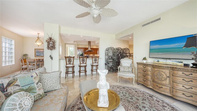 living room featuring ceiling fan