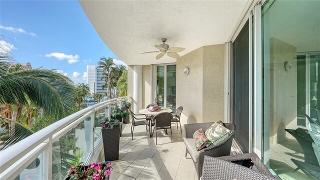 balcony featuring ceiling fan