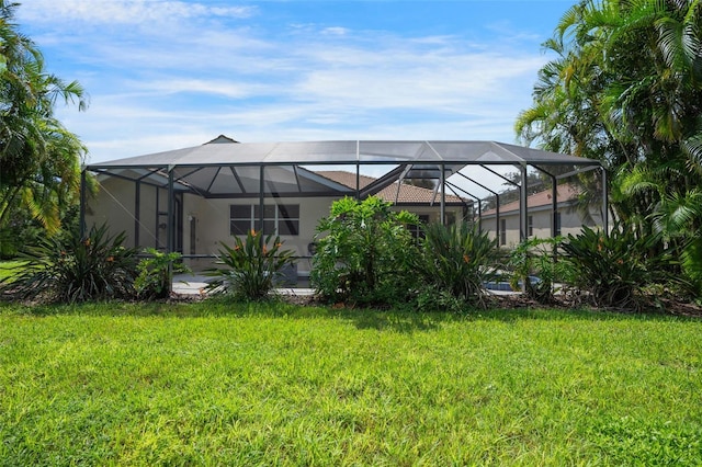 view of yard featuring a lanai