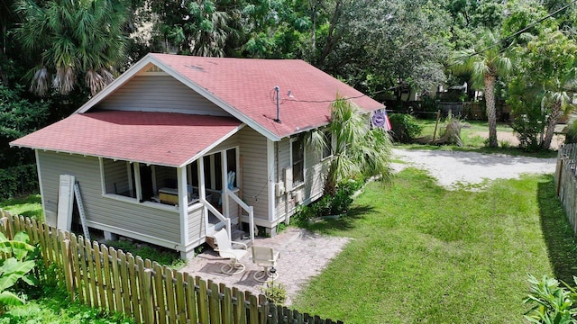 view of home's exterior featuring a lawn