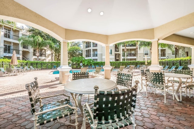 view of patio with a community pool