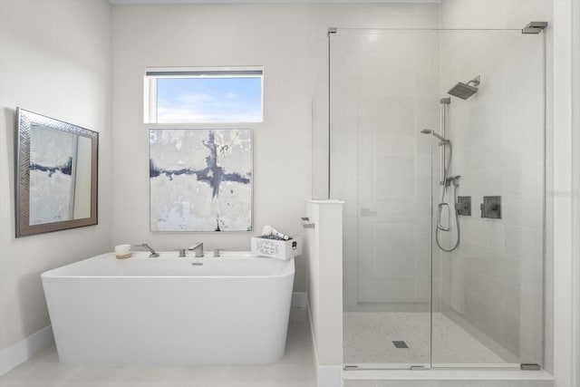 bathroom with tile patterned flooring and independent shower and bath