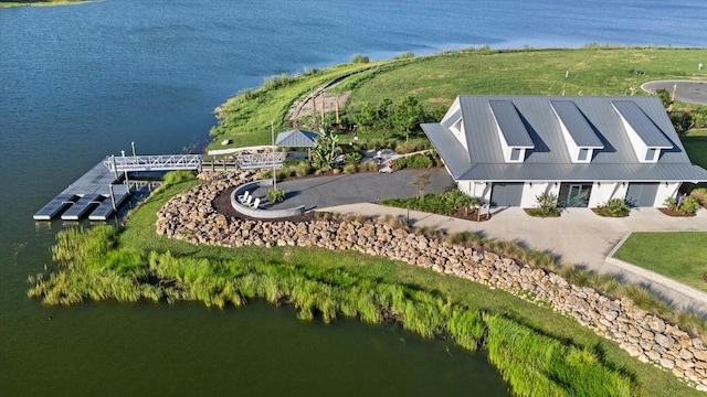 drone / aerial view featuring a water view