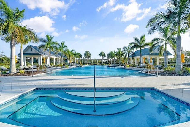 view of swimming pool featuring a patio