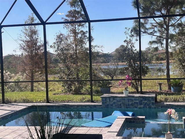 view of swimming pool with a lanai and a water and mountain view