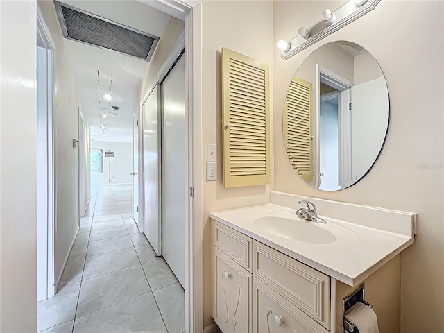 bathroom with vanity and tile patterned floors