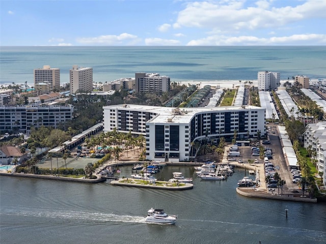 bird's eye view featuring a water view and a city view