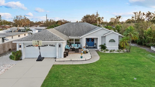 ranch-style home featuring a front lawn and a garage