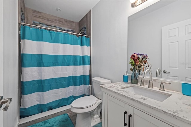 full bath with a shower with shower curtain, toilet, and vanity