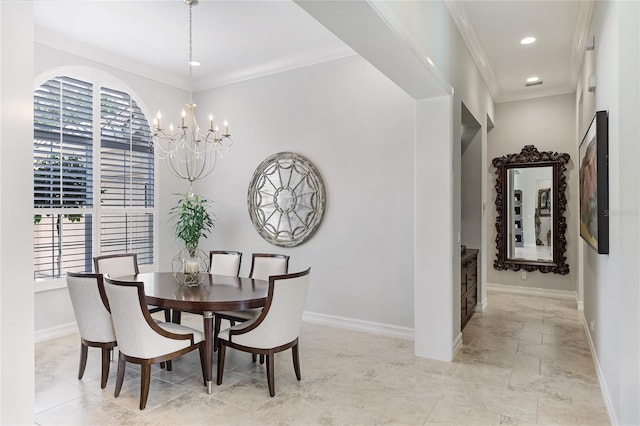 dining area with crown molding and an inviting chandelier