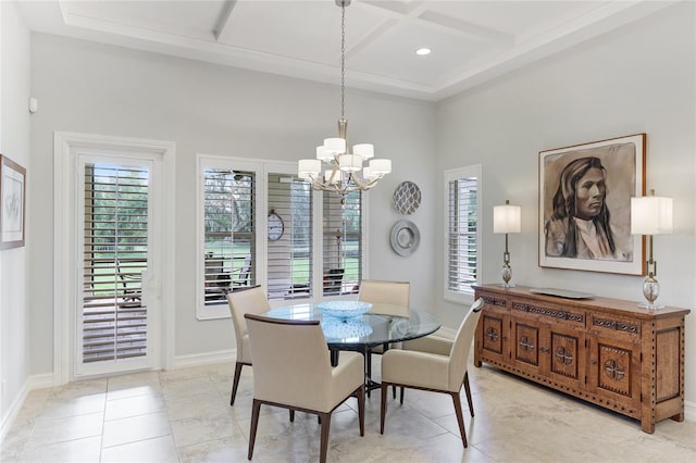 tiled dining area featuring coffered ceiling, a chandelier, and a healthy amount of sunlight