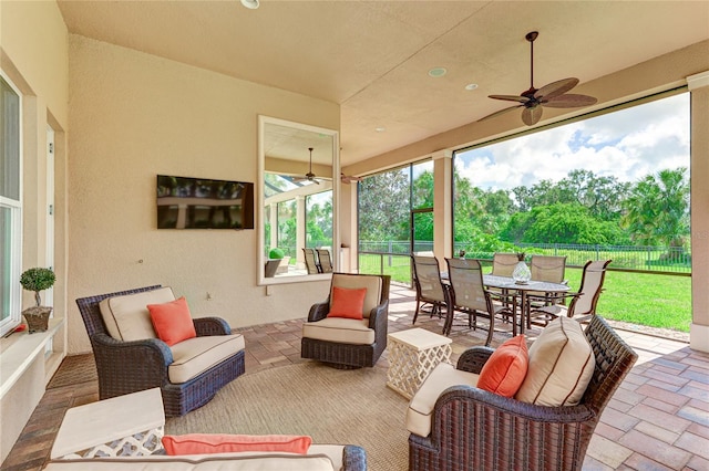 view of patio featuring ceiling fan