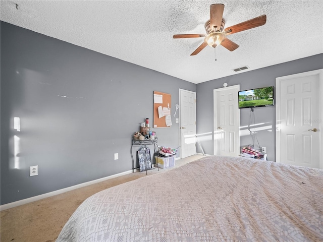 5337 Jacob Ave, Polk City, FL 33868 - bedroom with carpet, a textured ceiling, a ceiling fan, visible vents, and baseboards