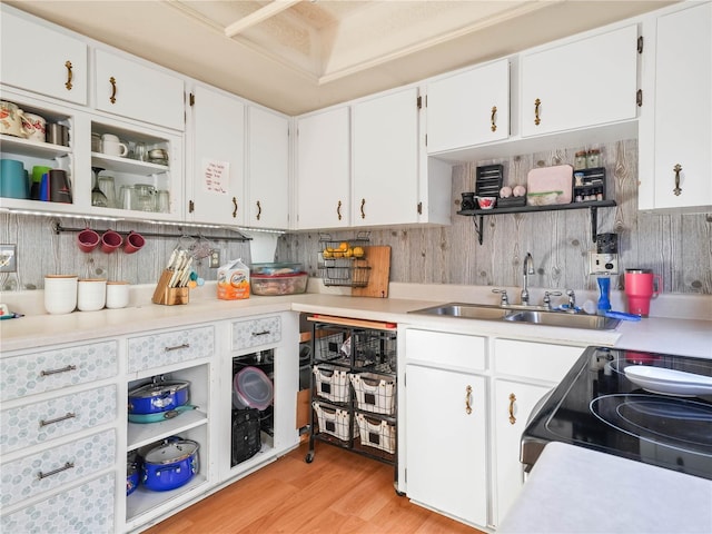 5337 Jacob Ave, Polk City, FL 33868 - kitchen featuring a sink, open shelves, electric range, and white cabinetry
