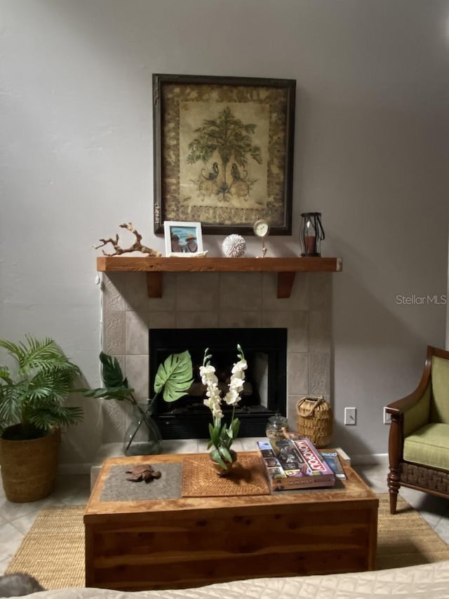 sitting room with a fireplace