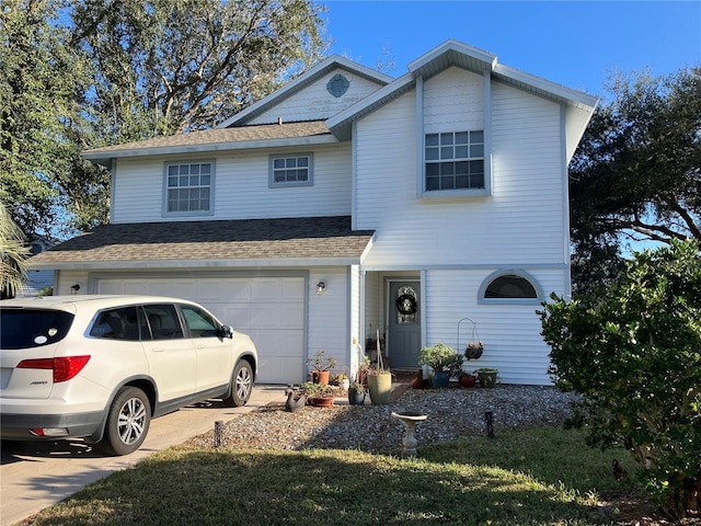 front of property with a garage