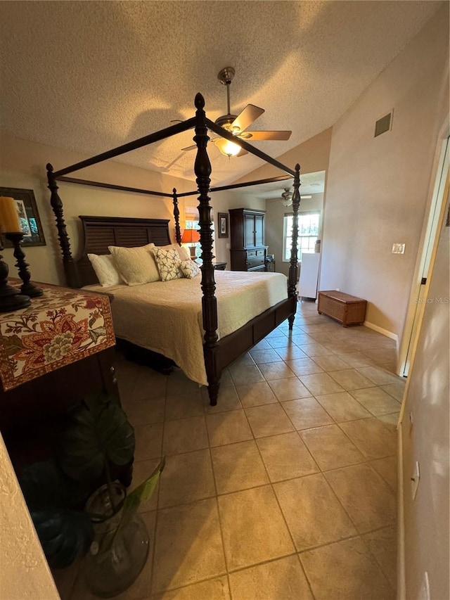 20 Bristol Ln, Palm Coast, FL 32137 - bedroom with a textured ceiling, light tile patterned floors, baseboards, and a ceiling fan