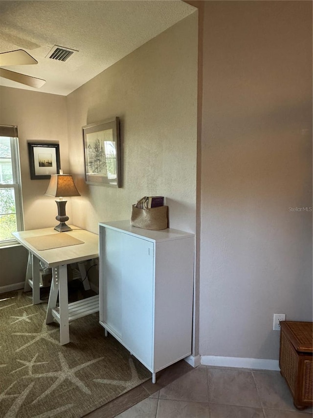 20 Bristol Ln, Palm Coast, FL 32137 - corridor featuring baseboards and a textured ceiling