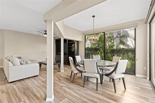 dining space featuring ceiling fan and light hardwood / wood-style flooring