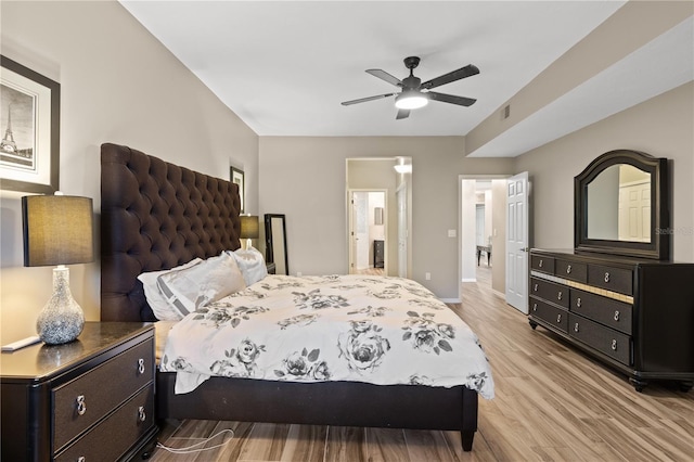 bedroom featuring light hardwood / wood-style floors and ceiling fan