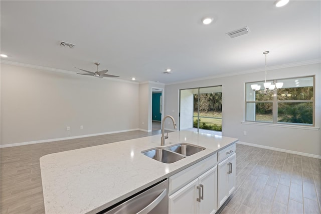 kitchen featuring light hardwood / wood-style floors, light stone countertops, sink, and white cabinets