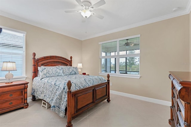 bedroom with ceiling fan, light tile patterned flooring, ornamental molding, and multiple windows