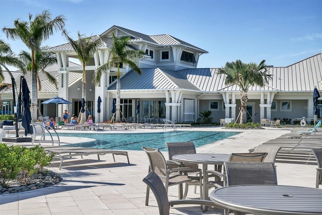 view of swimming pool featuring a patio